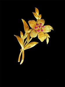 Ruby flower brooch