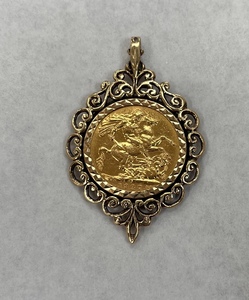 1907 full Sovereign mounted in 9ct